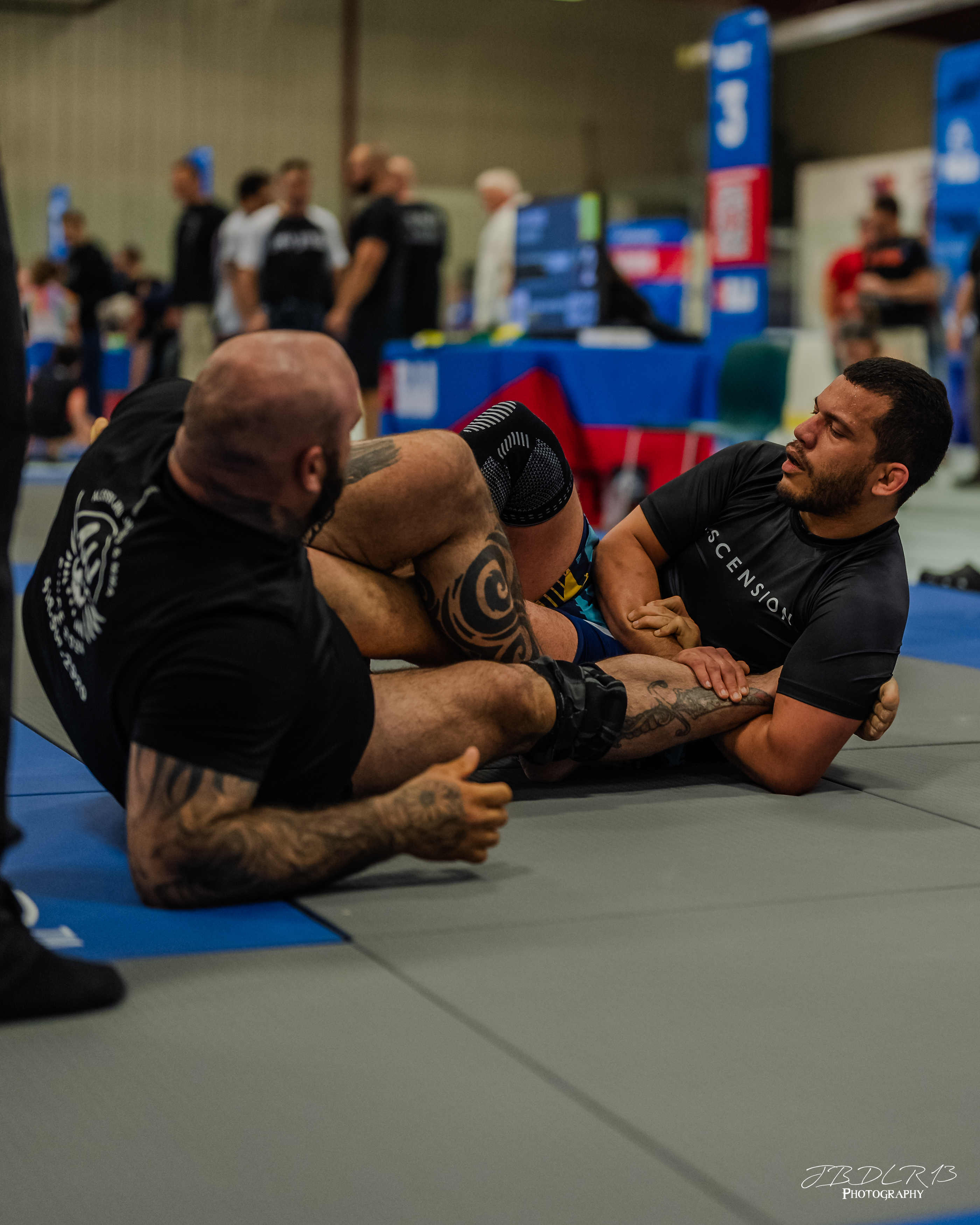 Student tying their BJJ belt