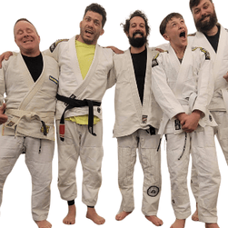 Adults practicing Brazilian Jiu-Jitsu