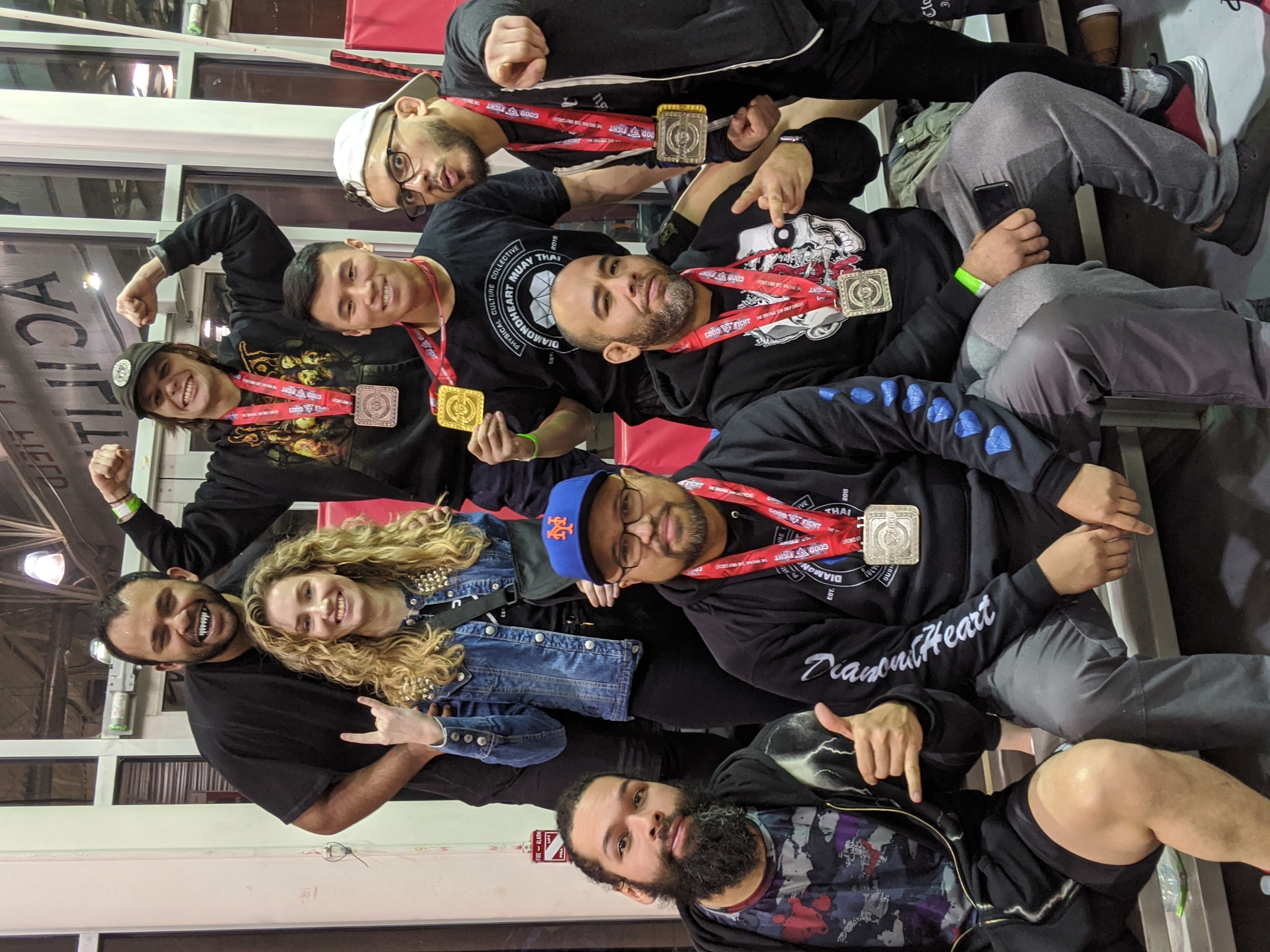Smiling students after tournament with Sensei Sandy