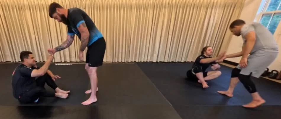 Adults and students learning Brazilian Jiu-Jitsu at Sensei Sandy BJJ