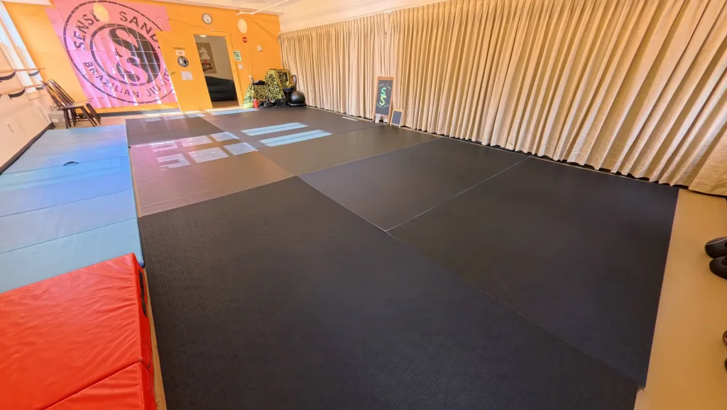 Clean matted training room at Sensei Sandy BJJ in Tannersville